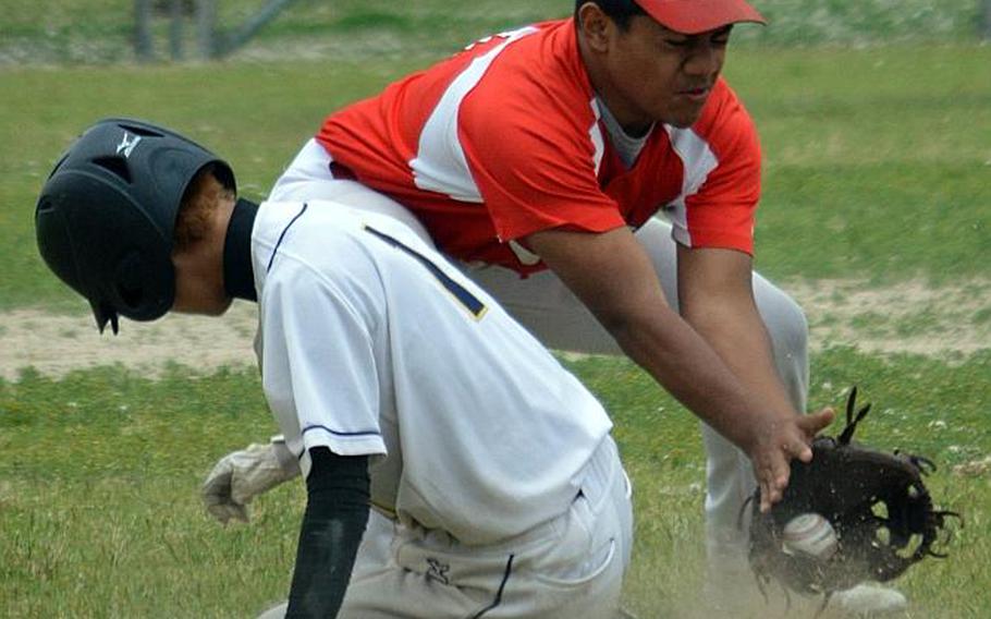 Nile C. Kinnick's Harry Cheng tries to put the tag on St. Mary's Neo Yoshii during Tuesday's round-robin game in the Far East Division I Baseball Tournament. The teams tied 8-8. CALEB RIVERA/SPECIAL TO STRIPES