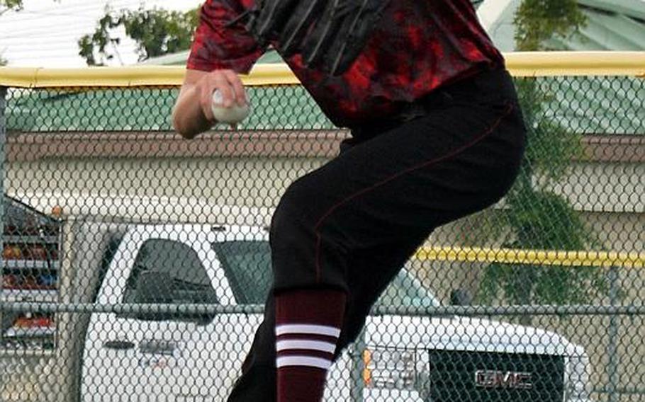 Matthew C. Perry's Chad Schuch kicks and delivers against Yokota during Tuesday's game in the Far East Division II Baseball Tournament. The Samurai scored thrice in the bottom of the seventh to edge the two-time defending champion Panthers 3-2. DENISA KIM/SPECIAL TO STRIPES