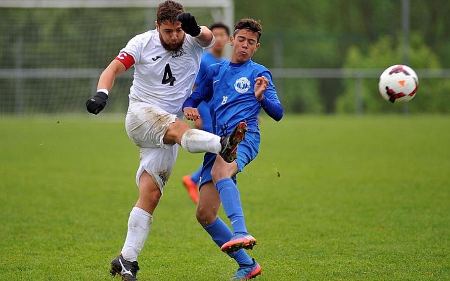 Naples' Matteo Pugliese gets off a shot against Ramstein's Diego Colon in a Division I semifinal at the DODEA-Europe soccer championships in Reichenbach, Germany. Ramstein beat Naples 1-0 in overtime to advance to Saturday's final.