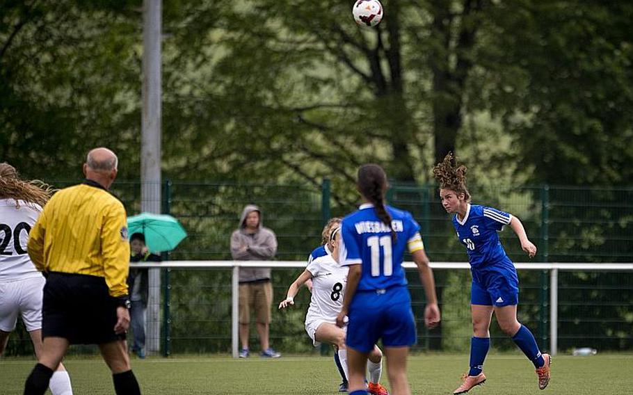 Wiesbaden's Camryn Angel, right, heads the ball during the DODEA-Europe Division I semifinals in Reichenbach, Germany, on Friday, May 19, 2017. Wiesbaden beat Naples 3-1. MICHAEL B. KELLER/STARS AND STRIPES