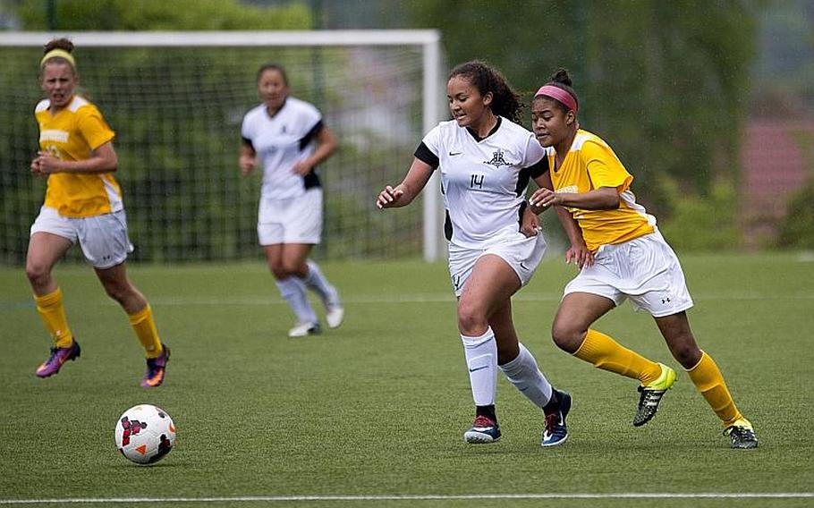 Ramstein's Haley Deome, left, and Stuttgart's Victoria Antoine race to the ball during the DODEA-Europe Division I semifinals in Reichenbach, Germany, on Friday, May 19, 2017. Ramstein lost the match 4-0. MICHAEL B. KELLER/STARS AND STRIPES
