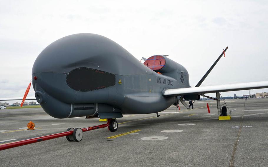 An RQ-4 Global Hawk sits on the tarmac at Yokota Air Base, Japan, Wednesday, May 24, 2017.