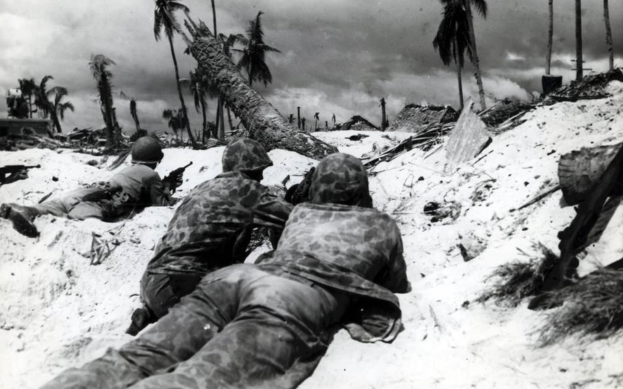 After heavy bombardment, the 2nd Marine Division hit the beaches of Betio Island in the Tarawa Atoll, Nov. 20, 1943. They were met by heavy Japanese resistance, which included thousands of troops in a network of fortified pillbox bunkers and concrete blockhouses.