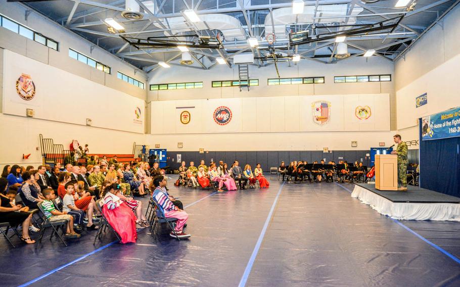 Rear Adm. Brad Cooper, Navy Region Korea commander, speaks during the closing ceremony for C.T. Joy Elementary/Middle School at Chinhae Naval Base, South Korea, June 2, 2017.