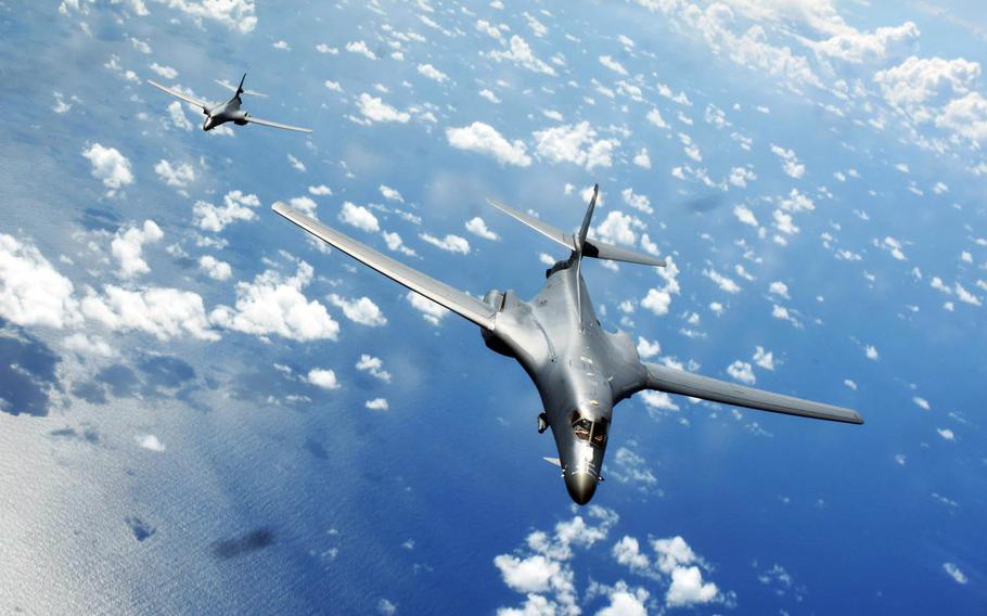 Two Air Force B-1B Lancers fly a 10-hour mission from Andersen Air Force Base, Guam, through the South China Sea, while operating with the Navy's guided-missile destroyer USS Sterett, Thursday, June 8, 2017.