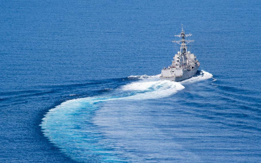 The guided-missile destroyer USS Dewey transits the South China Sea in May.