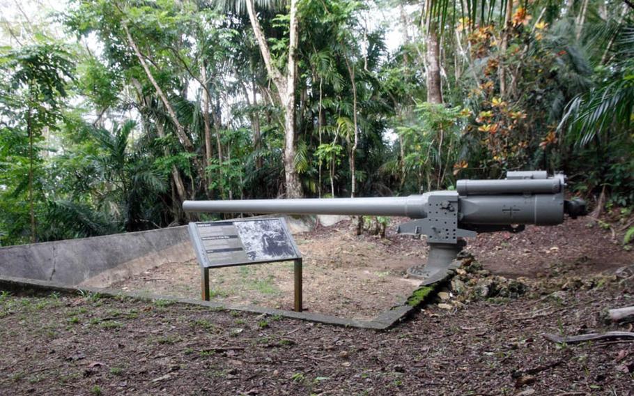 A Japanese canon stands on a Guam mountainside and is now part of a National Park Service display of World War II artifacts. Local Guam residents were forced to help build this and other defense emplacements in advance of the anticipated invasion by American forces in 1944.