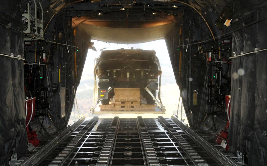A Humvee is air dropped out of a C-130 Hercules over Hohenfels Training Area, Germany, April 11, 2016. A sergeant with the 173rd Airborne Brigade has been charged in connection with the destruction of three Humvees that plummeted to the ground that day.
