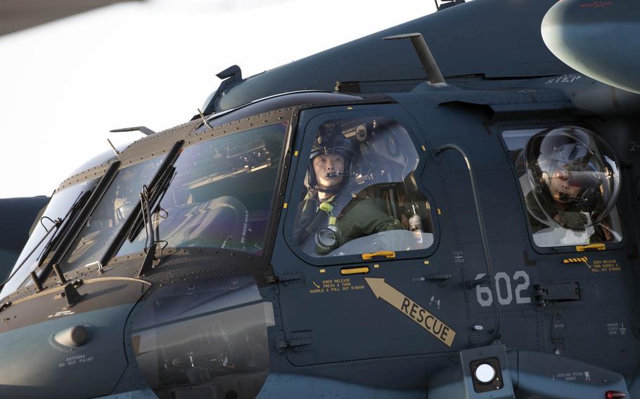Japan Air Self-Defense Force crew members take part in helicopter air-to-air refueling training over the Sea of Japan, June 19, 2017.