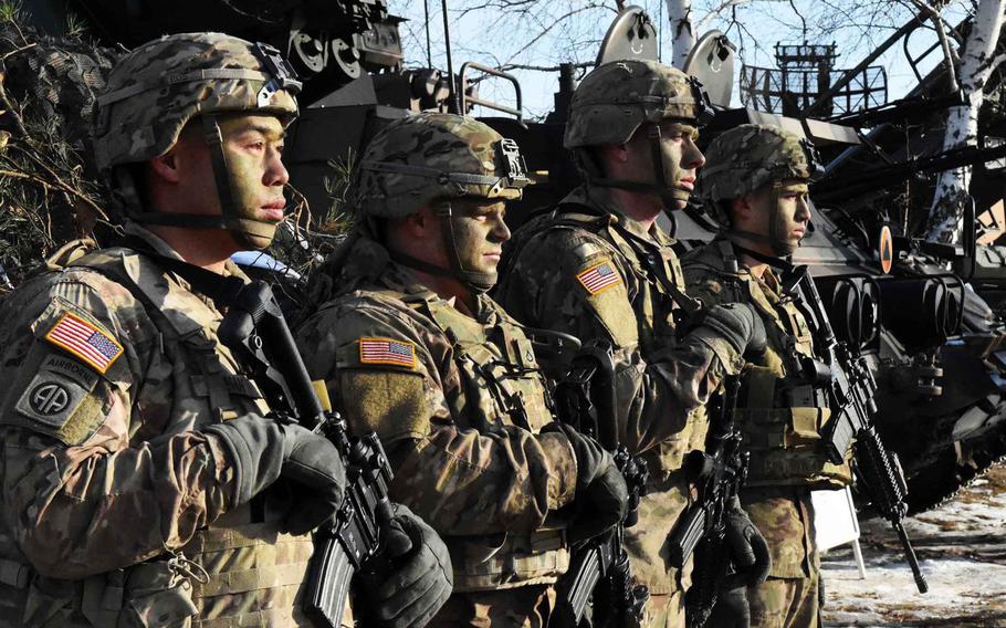 American soldiers stand in front of their vehicles at a live fire exercise in Zagan, Poland, on Monday, Jan. 30, 2017. An Inspector General's report, released this week, cautioned that the resources for carrying out the military's European Reassurance Initiative could fall short of the demands of a campaign designed to reinforce NATO's eastern flank.
