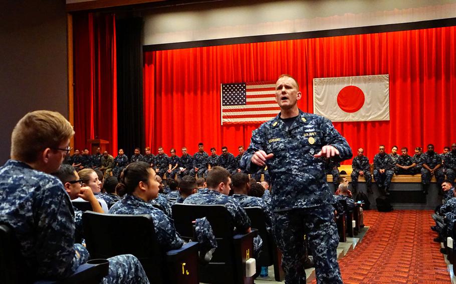 Master Chief Petty Officer of the Navy Steven Giordano speaks to sailors during a town hall meeting at Yokosuka Naval Base, Japan, Wednesday, Sept. 13, 2017.