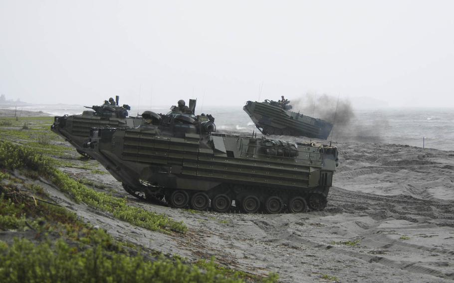 U.S. and Philippine Marines participating in last year's PHIBLEX drills land on a beach on the island of Luzon in amphibious-assault vehicles.