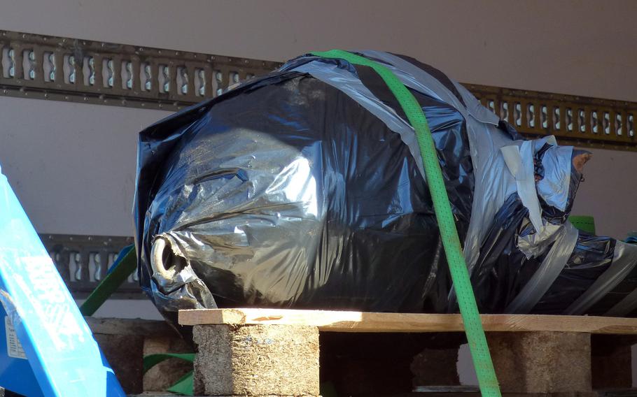 A bomb found at a construction site in the Kaiserslautern district of Einsiedlerhof sits wrapped on a pallet after being defused on March 26, 2017. A 250-pound allied World War II bomb discovered by a mushroom hunter in the woods near Einsiedlerhof will be defused on Wednesday. It's the fourth WWII-era bomb to be found in the area in the past several months.