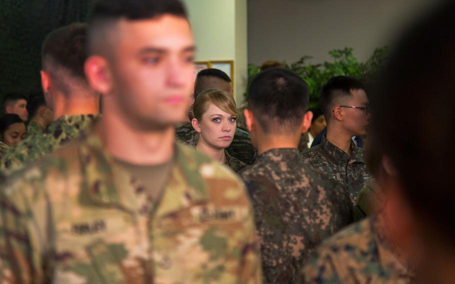 Troops wait for U.S. and South Korean leaders Donald Trump and Moon Jae-in to arrive for lunch at Camp Humphreys, South Korea, Tusday, Nov. 7, 2017.