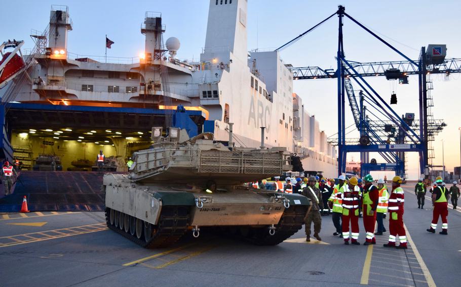 An M1A2 Abrams Battle Tank from 2nd Armored Brigade Combat Team, 1st Infantry Division, offloads from a ship in Gdansk, Poland, Sept. 13, 2017. NATO is planning to form two new commands that will focus on ensuring U.S. forces and equipment can move safely across the Atlantic to Europe and that allies can maneuver faster on the Continent.