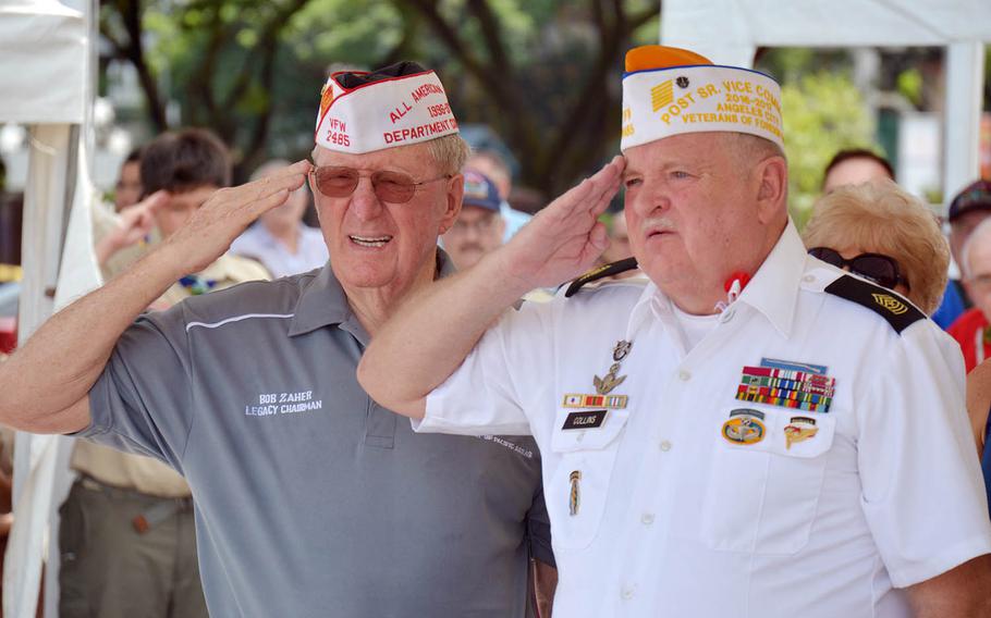 Veterans in the Philippines take part in a Veterans Day ceremony at Clark Veterans Cemetery, Saturday Nov. 11, 2017.
