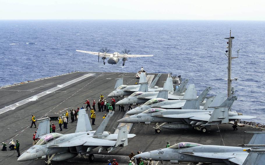 A C-2A Greyhound launches from the flight deck of the aircraft carrier USS Ronald Reagan in the Philippine Sea, Nov. 17, 2017.