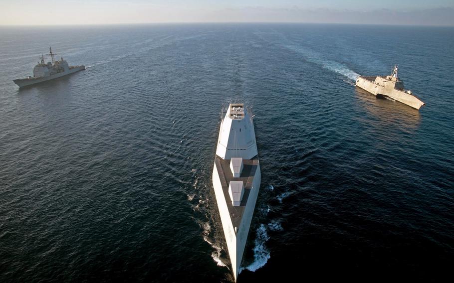 The Navy's most technologically advanced surface ship USS Zumwalt steams in formation with the USS Independence and the USS Bunker Hill in the Pacific Ocean in 2016. A proposed 30 percent increase in the number of Navy battle force ships is one factor accounting for a projected hike in military spending over the next 10 years.