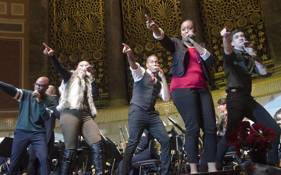 Members of the U.S. Army Europe band and chorus perform "Joyful, Joyful" during a Christmas concert at the Kurhaus in Wiesbaden, Germany, Wednesday, Dec. 6, 2017. This is the band's sixth annual performance at the Kurhaus, a tradition the garrison commander said he would like to continue.