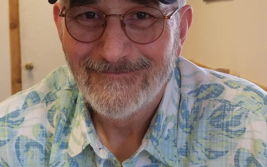Vietnam veteran and poet John Musgrave wears a Purple Heart cap in this photo taken in July. After being shot in the face and chest in November 1967, sustaining life-threatening and permanently disabling injuries, Musgrave overcame severe post-traumatic stress and now helps to counsel post-911 veterans. Photo courtesy of John Musgrave