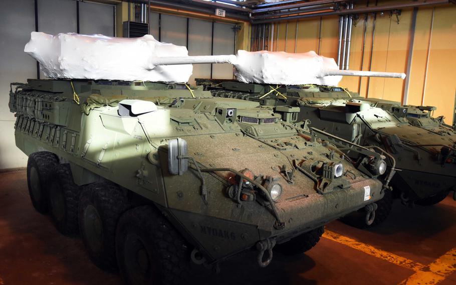 Two of the 2nd Cavalry Regiment's new upgunned Strykers with 30 mm cannons still wrapped, at Vilseck, Germany, Wednesday, Dec. 13, 2017.