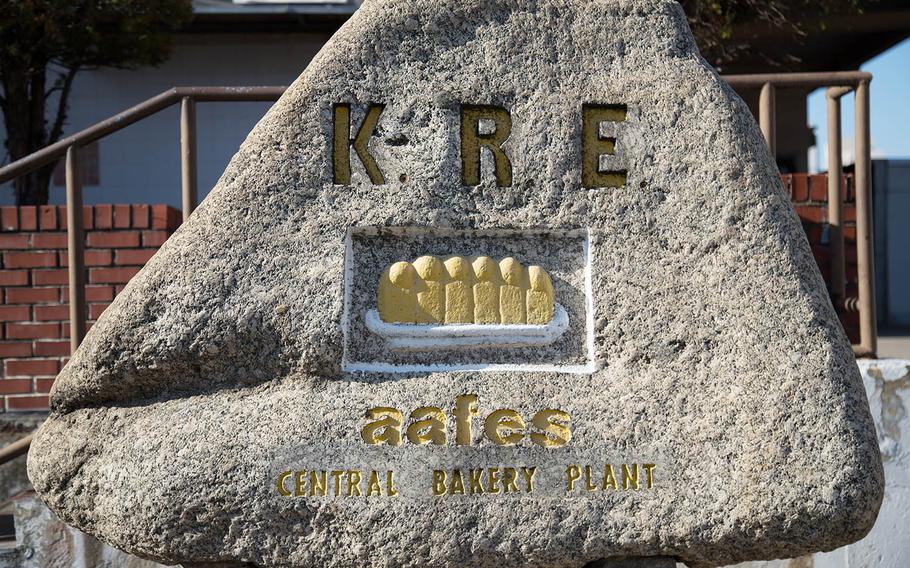 A stone statue sits in front of the Army and Air Force Exchange Service bakery at Camp Market, South Korea, Tuesday, Dec. 5, 2017.