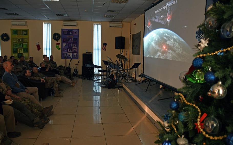 Troops watch "Star Wars: The Last Jedi" in the chapel on a coalition base at Hamid Karzai International Airport in Kabul, Afghanistan, on Saturday, Dec. 23, 2017.