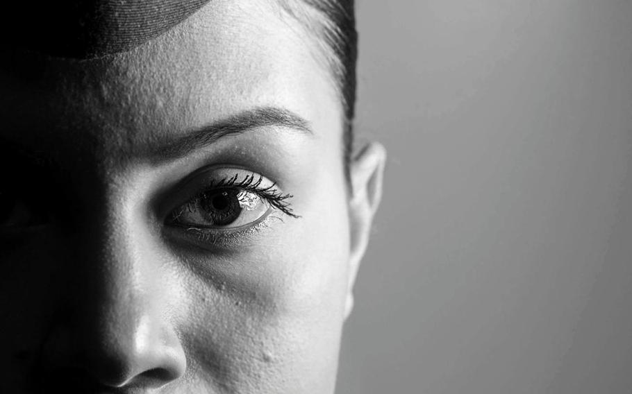 A Marine poses for an official portrait series for Sexual Assault Awareness and Prevention Month.
