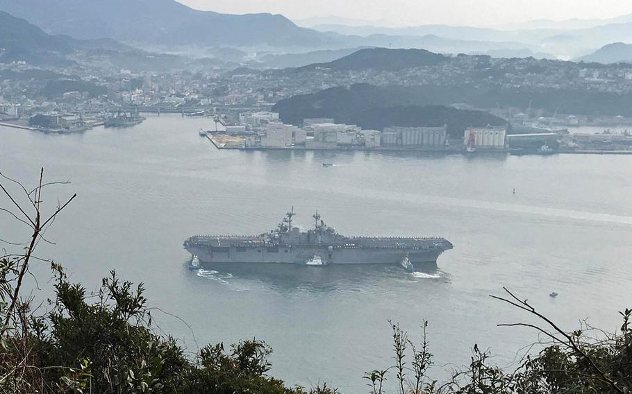 The amphibious-assault ship USS Wasp arrives at Sasebo Naval Base, Japan, Sunday, Jan. 14, 2018.