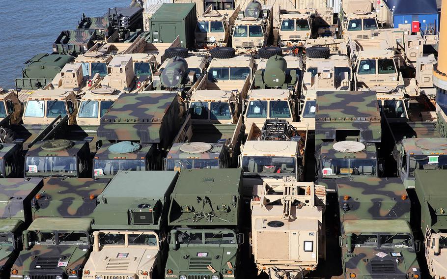 Dozens of military vehicles sit last spring on the top deck of heavy-lift vessel Ocean Jazz, which were used in the Talisman Sabre exercise in Australia as part of the Army's Pacific Pathways.