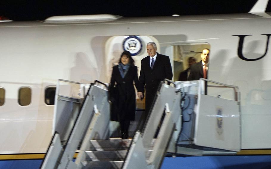 Vice President Mike Pence and his wife, Karen, arrive at Yokota Air Base in western Tokyo, Tuesday, Feb. 6, 2017.