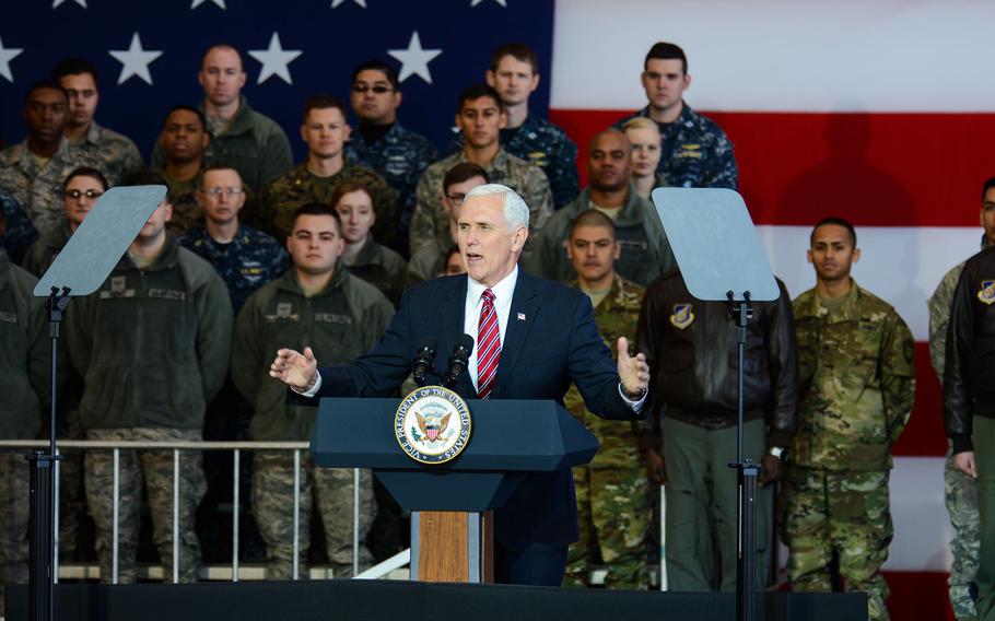 Vice President Mike Pence speaks to U.S. and Japanese troops at Yokota Air Base, Japan, Thursday, Feb. 8, 2018.