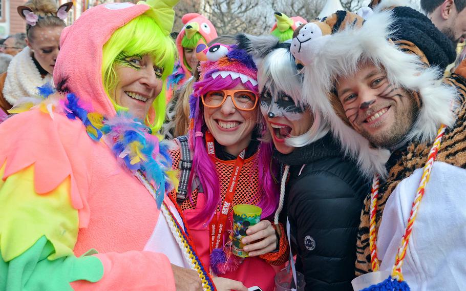 A group of revelers celebrates Weiberfastnacht, or women's carnival, in Mainz, Germany, Thursday, Feb. 8, 2018. As one can see, not only women were ceslebrating.
