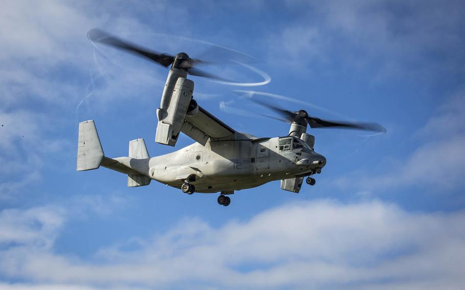 An MV-22B Osprey with Marine Medium Tiltrotor Squadron 262 flies over Camp Hansen, Okinawa, Japan, Nov. 28, 2017.