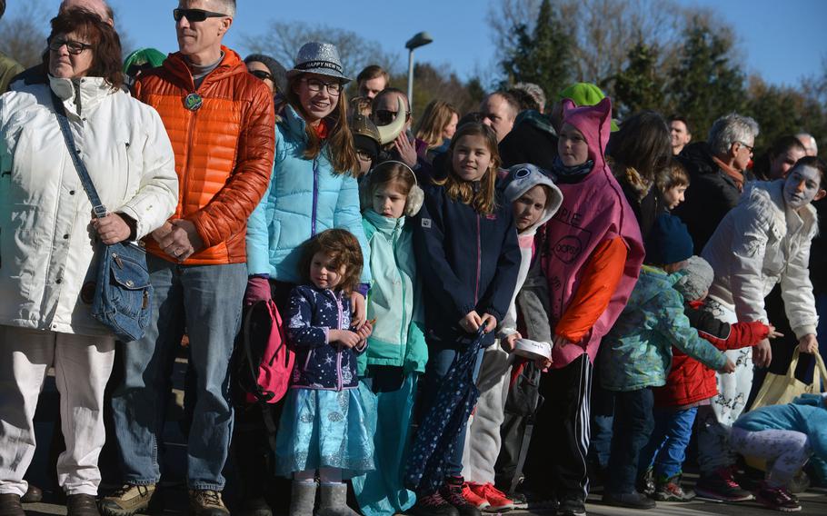 Children wait in anticipation as the 67th annual in Ramstein-Miesenbach Fasching parade gets underway Tuesday, Feb. 13, 2018. Michael Abrams/Stars and Stripes
