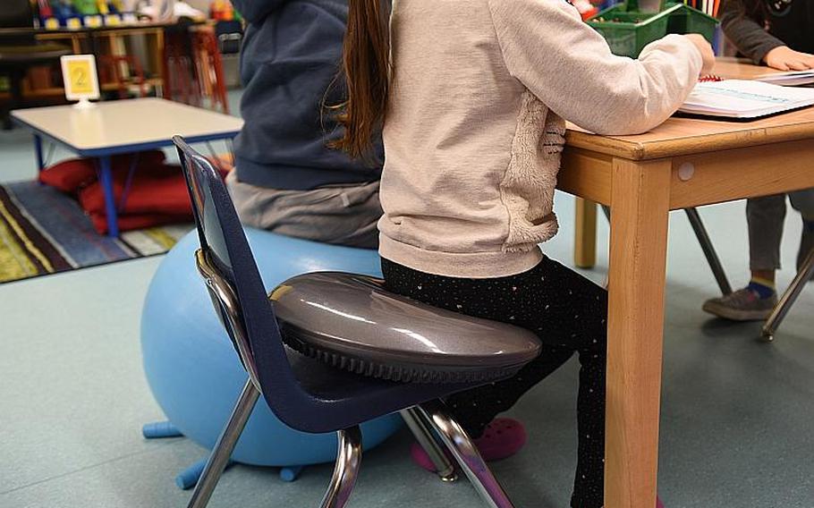 A bouncy cushion is one flexible seating option in Kelli Keedwell's kindergarten class at Ramstein Elementary School, Germany.