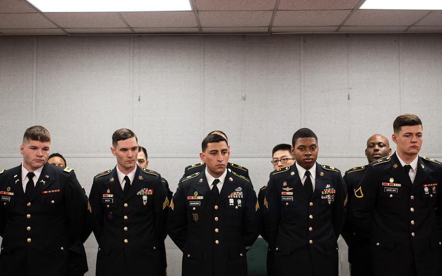 19th Expeditionary Sustainment Command best-warrior competitors receive a brief on their next event, a formal board, at Camp Henry, South Korea, Thursday, March 8, 2018.