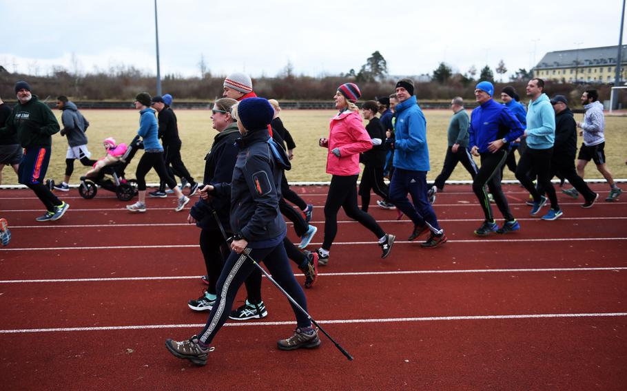 Soldiers and family members walking during the Bavarian Health Initiative 5K at Grafenwoehr, Germany, Friday, March 23, 2018.