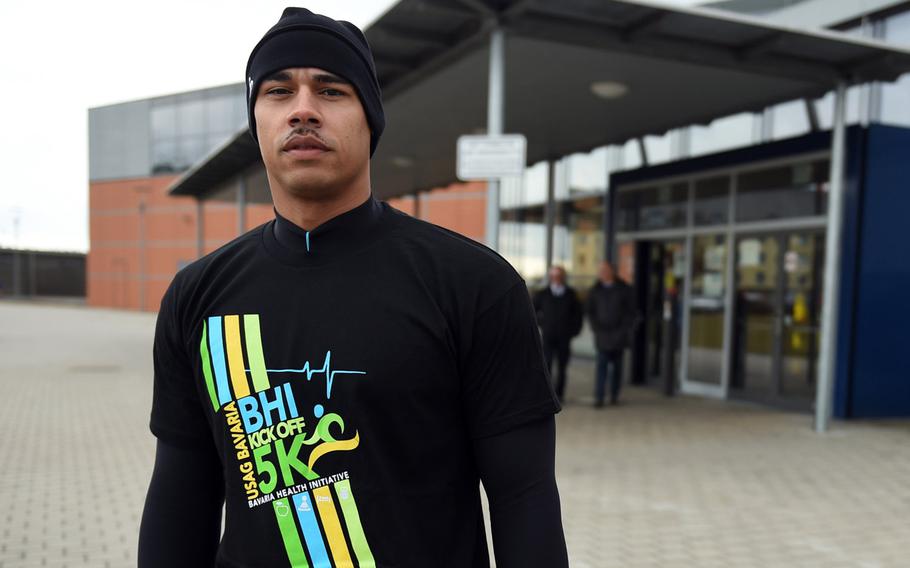 Staff Sgt. Dewayne Hawk wears a Bavarian Health Initiative shirt at the BHI 5K at Grafenwoehr, Germany, Friday, March 23, 2018.