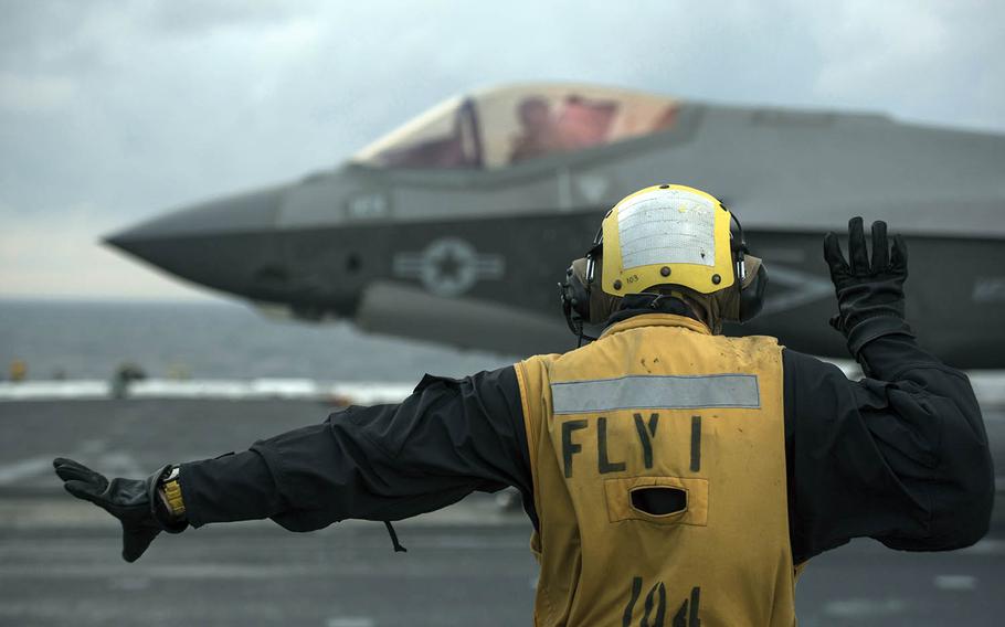 Petty Officer 1st Class Antonio Rodriguez recently directs an F-35C Lightning II aboard the aircraft carrier USS Abraham Lincoln in the Atlantic Ocean.