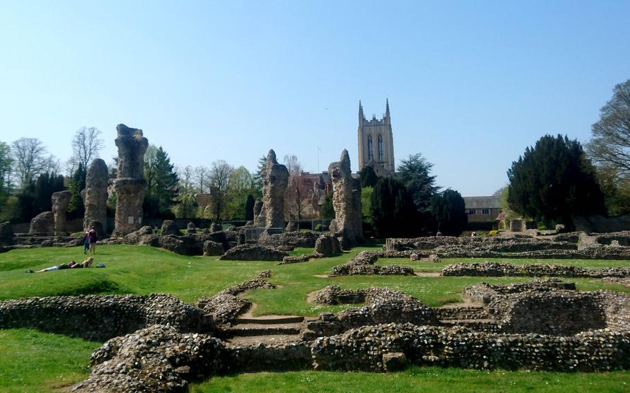 The ruins of an 11th-century Benedictine Abbey inside the Abbey Gardens in Bury St. Edmunds, England. The abbey was damaged by rioting townspeople in 1327 and stripped of its valuable building materials when it was surrendered to King Henry VIII in 1539, after his break with the Catholic Church.