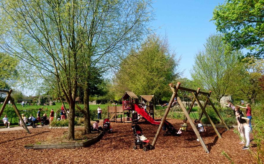 Children can play in a special area at the Abbey Gardens in Bury St. Edmunds, England. The 14-acre park also features a rose garden, wildlife feeding area, a small aviary with a variety of birds, an herb garden, a sensory garden for the blind, a bowling green and a tennis court.
