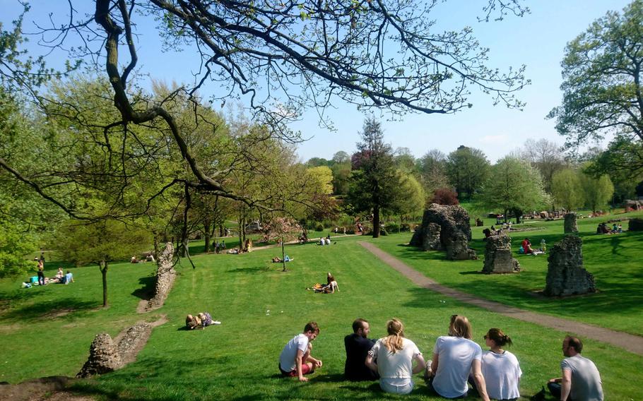 Visitors enjoy a sunny afternoon at the Abbey Gardens in Bury St. Edmunds, England. For the past nine years the Abbey Gardens has earned the Green Flag Award Scheme, an international mark of quality for parks and green space.