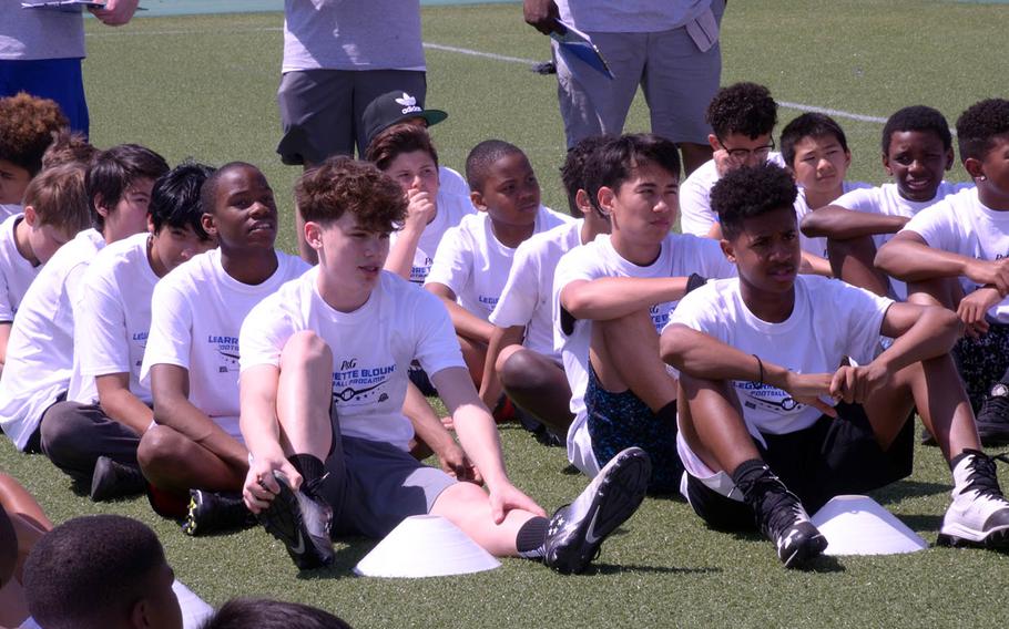 Hundreds of children take part in a football clinic by three-time Super Bowl champion LeGarrette Blount at Yokosuka Naval Base, Japan, Saturday, April 28, 2018.