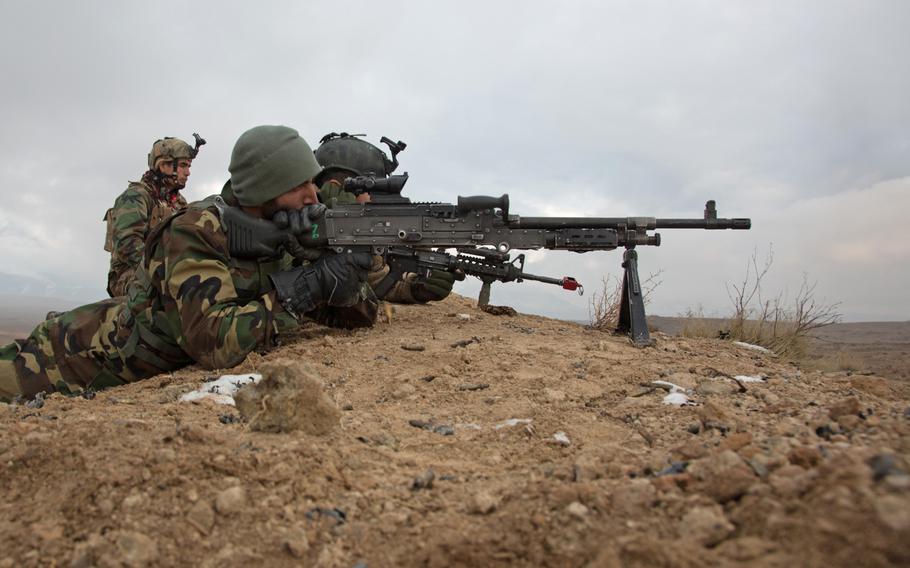 Special operators of the Afghan National Mission Brigade conduct day and night platoon live fires during a training exercise at the Kabul Military Training Complex, Kabul, Afghanistan, Feb. 12, 2018.
