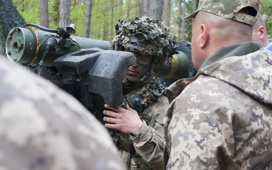 A soldier demonstrates how to use the Javelin antitank missile system as a delegation of Ukrainian military officials observes at at Hohenfels Training Area, Germany on May 9, 2017. The U.S. has delivered antitank missiles to Ukraine, the first shipment of lethal aid to the country.