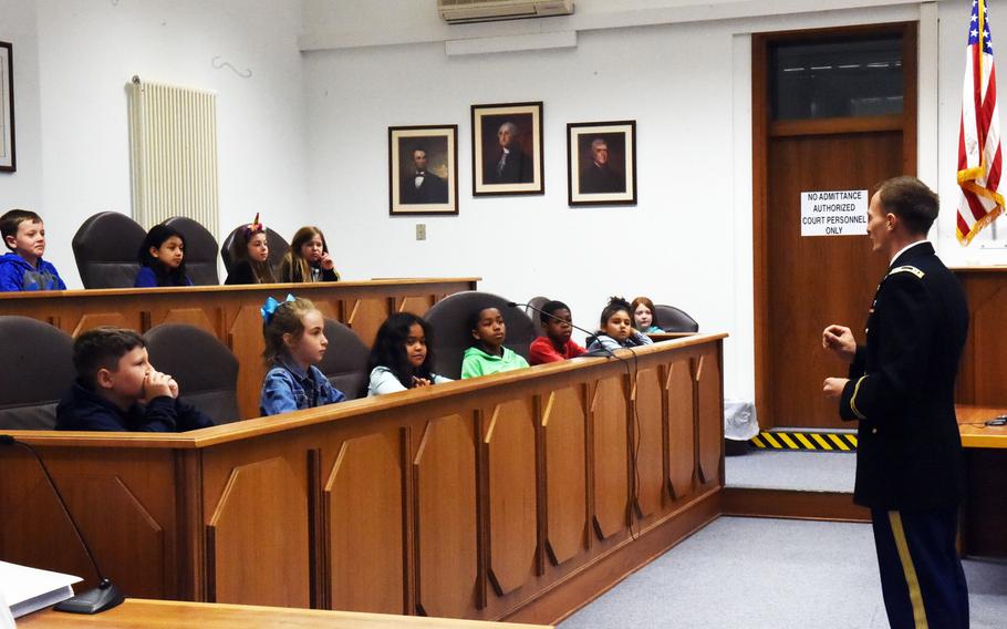 Capt. Brett Grantham makes his opening remarks to the fourth-grade jury at the mock trial of Luke Skywalker, Tuesday, May 1, 2018, at Vilseck, Germany.