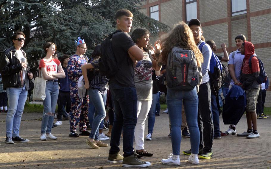 Teenagers gather outside their Defense Department school on the first day of school last year. A community forum geared toward providing parents and teachers of teenagers with the tools to build emotional resiliency takes place on May 10 at Ramstein Middle School in Germany.