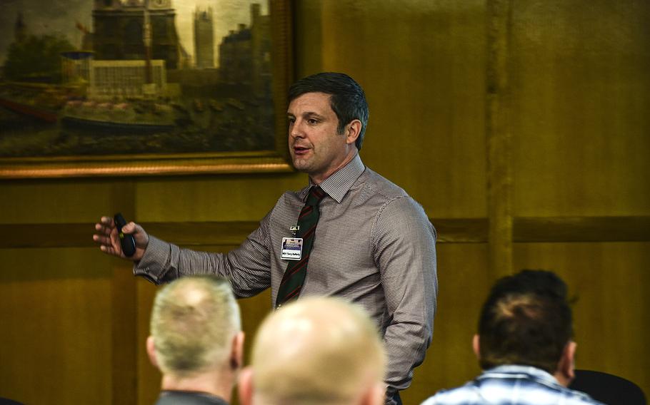 British army Warrant Officer 1 Terry Rafferty speaks to assembled top noncommissioned officers from across Europe at the 12th annual Council of European Armies for Noncommissioned Officers, Wednesday, May 2, 2018, in London. Rafferty spoke on the education system for British NCOs.