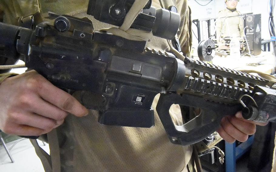 An M4 assault rifle with 3D-printed magazine well and foregrip made with the Rapid Fabrication via Additive Manufacturing 3D-printing unit, Hohenfels, Germany, Tuesday, May 8, 2018.